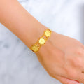 22k-gold-gorgeous-floral-coin-bracelet
