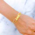 Shimmering Two-Tone Flower Bangle 22k Gold Bracelet