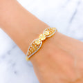 Shimmering Two-Tone Flower Bangle 22k Gold Bracelet