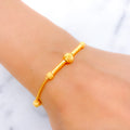 Trendy Barrel Accented 22k Gold Bracelet