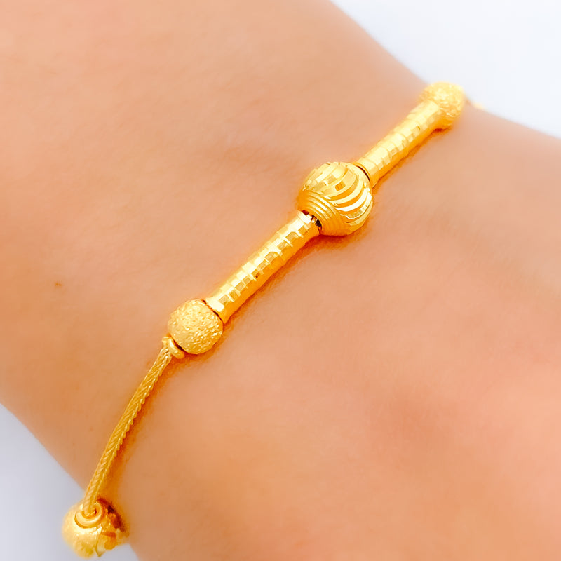 Trendy Barrel Accented 22k Gold Bracelet