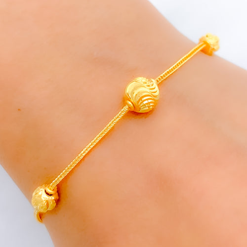 Wavy Orb 22k Gold Bracelet