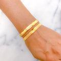 Shimmering Pair of Yellow Gold Bangles