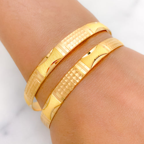 Shimmering Pair of Yellow Gold Bangles