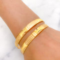 Shimmering Pair of Yellow Gold Bangles