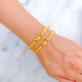 22k-gold-slender-white-meena-bangles