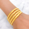 Wavy Styled Yellow Gold Bangles