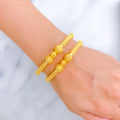 22k-gold-beaded-ribbon-bangles