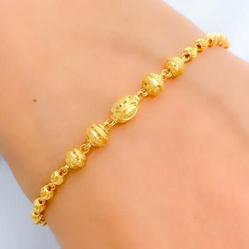 Leaf Accented Oval Bead Bracelet