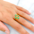 22k-gold-Tasteful Green CZ Spiral Ring