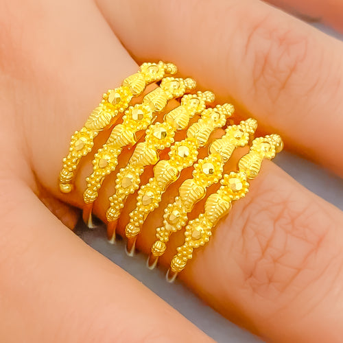 22k-gold-radiant-flower-accented-spiral-ring