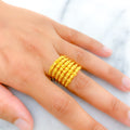 22k-gold-radiant-flower-accented-spiral-ring