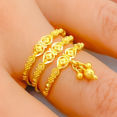 22k-gold-shimmering-symmetrical-tassel-spiral-ring