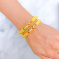 22k-gold-shimmering-vibrant-filigree-bangle-pair