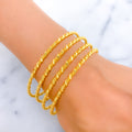 21k-gold-Opulent Stylish Rope Bangles 
