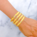 21k-gold-Two Tone Textured Shimmering Bangles 