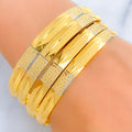 21k-gold-Two Tone Textured Shimmering Bangles 