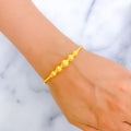 Graceful Graduated Orb Bangle Bracelet