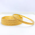 Flower Accented 22k Gold Bangles