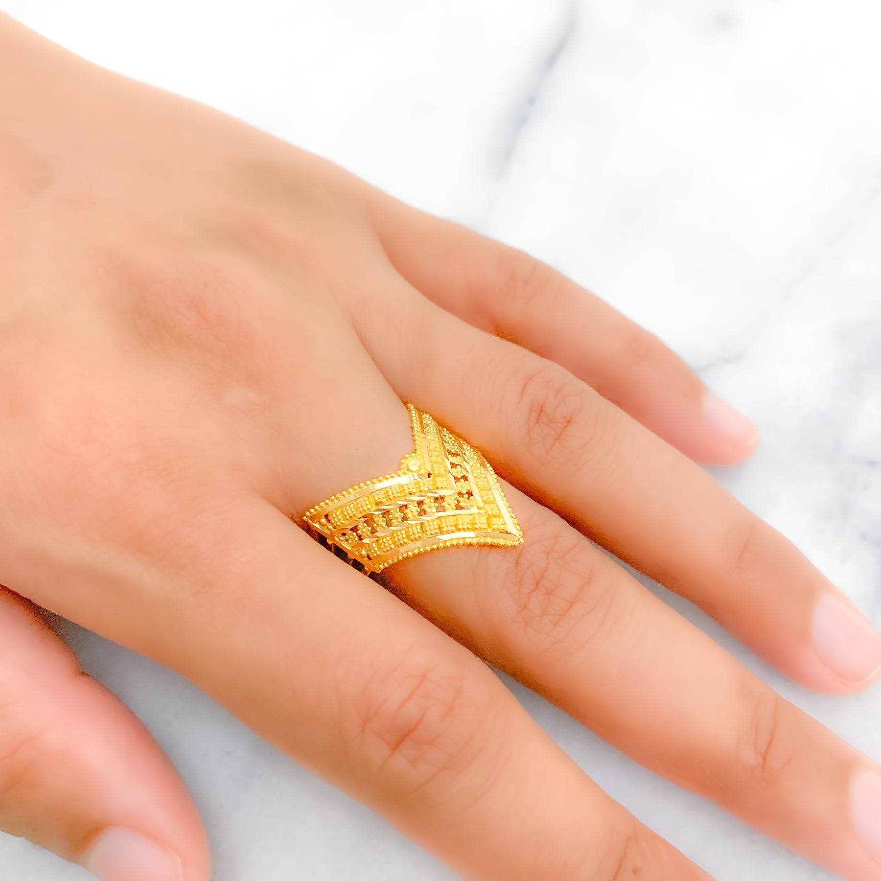 Gold tone white stone vanki finger ring dj-42461 – dreamjwell