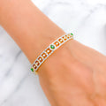 18k-gold-stunning-emerald-diamond-bangle