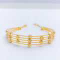 Chic Two-Tone Accented 22k Gold Wire Bracelet