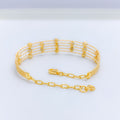 Chic Two-Tone Accented 22k Gold Wire Bracelet