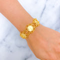 21k-gold-decorative-jazzy-bracelet-w-hanging-charm