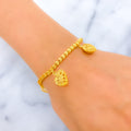 21k-gold-evergreen-modern-charm-bracelet