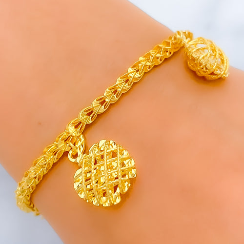 21k-gold-iconic-vibrant-charm-bracelet