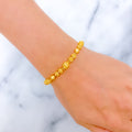 22k-gold-palatial-orb-bracelet