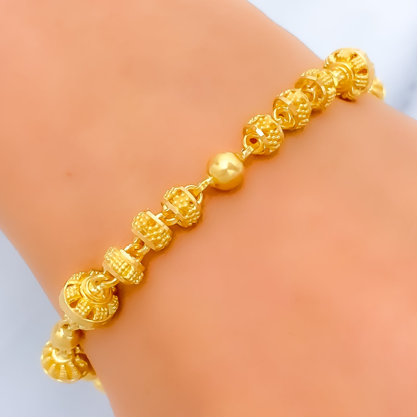 22Karat Gold handcrafted flexible bangle with a pair of tourmaline Flower  For Sale at 1stDibs | 22 karat gold bracelet, 22 karat gold bangles