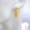 Ritzy Checkered Hanging 22k Gold Earrings