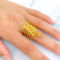 22k-gold-multi-color-tassel-spiral-ring