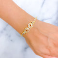 22k-gold-glowing-vine-bangle-bracelet