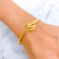 22k-gold-faceted-leaf-bangle-bracelet