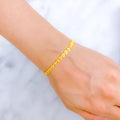 Iconic Symmetrical Reflective 22k Gold Bracelet