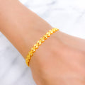 Iconic Symmetrical Reflective 22k Gold Bracelet