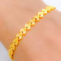 Iconic Symmetrical Reflective 22k Gold Bracelet