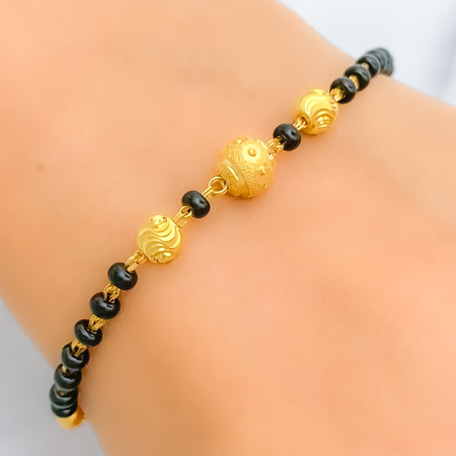 22k-gold-tasteful-black-bead-bracelet
