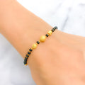 22k-gold-tasteful-black-bead-bracelet