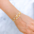 Flower Adorned Three-Tone 22k Gold Bangle