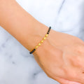 22k-gold-exquisite-black-bead-bracelet