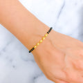 22k-gold-fashionable-black-bead-bracelet