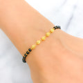 22k-gold-fashionable-black-bead-bracelet