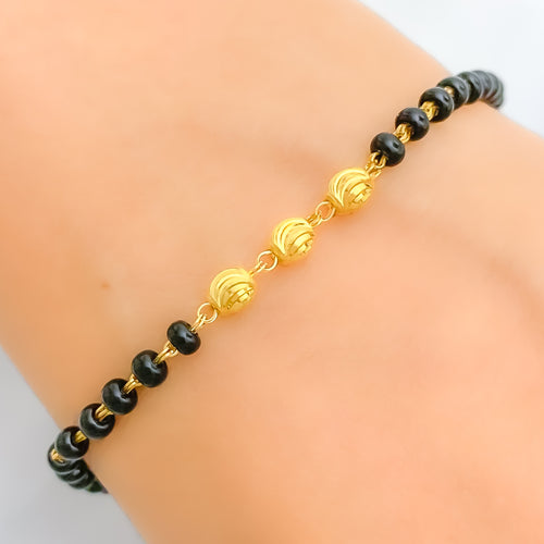 22k-gold-attractive-black-bead-bracelet