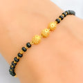 22k-gold-engraved-black-bead-bracelet