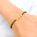 22k-gold-engraved-black-bead-bracelet