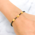 22k-gold-dainty-black-bead-bracelet