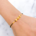 Matte Finish Black 22k Gold Bead Bracelet